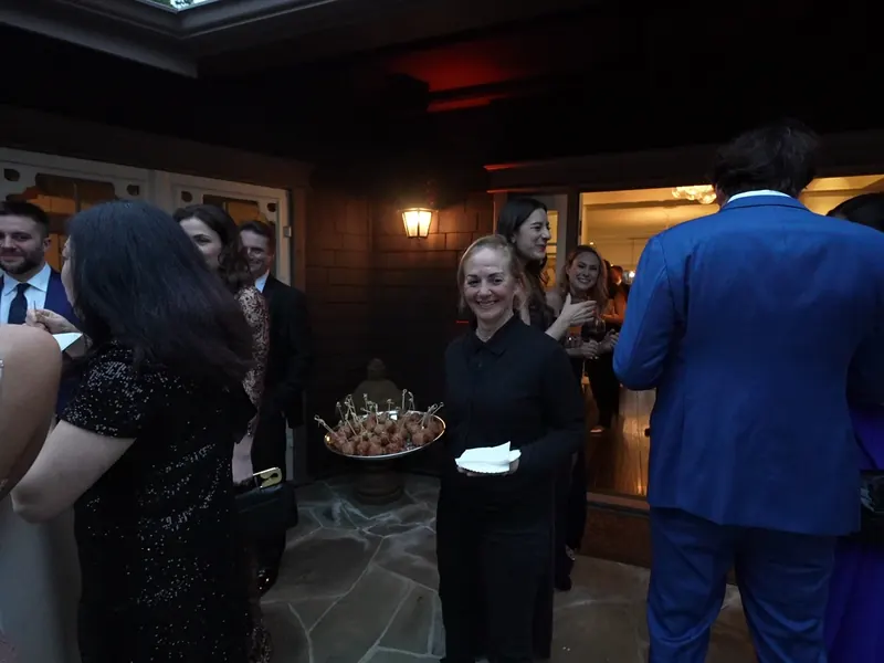 Server offering a tray of hors d'oeuvres to guests at a Livermore reception
